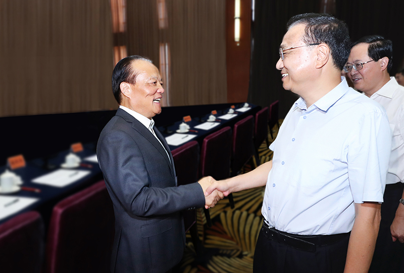 Li Keqiang, Member of the Political Bureau of the CPC Central Committee and Premier met with chairman of the board Zhang Yuqiang on September 28, 2018.